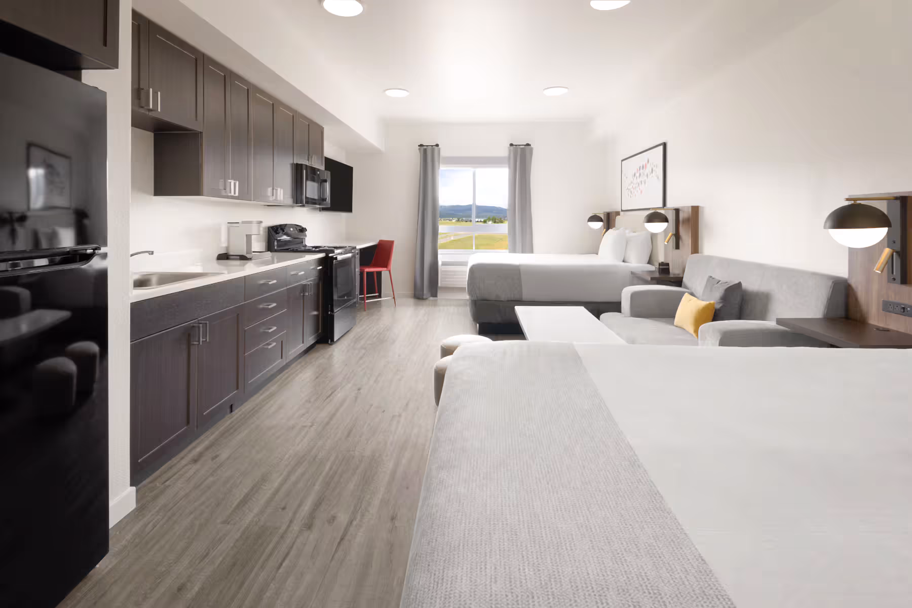 Guest room at the Hawthorn Extended Stay by Wyndham Jackson Alpine in Alpine, Wyoming